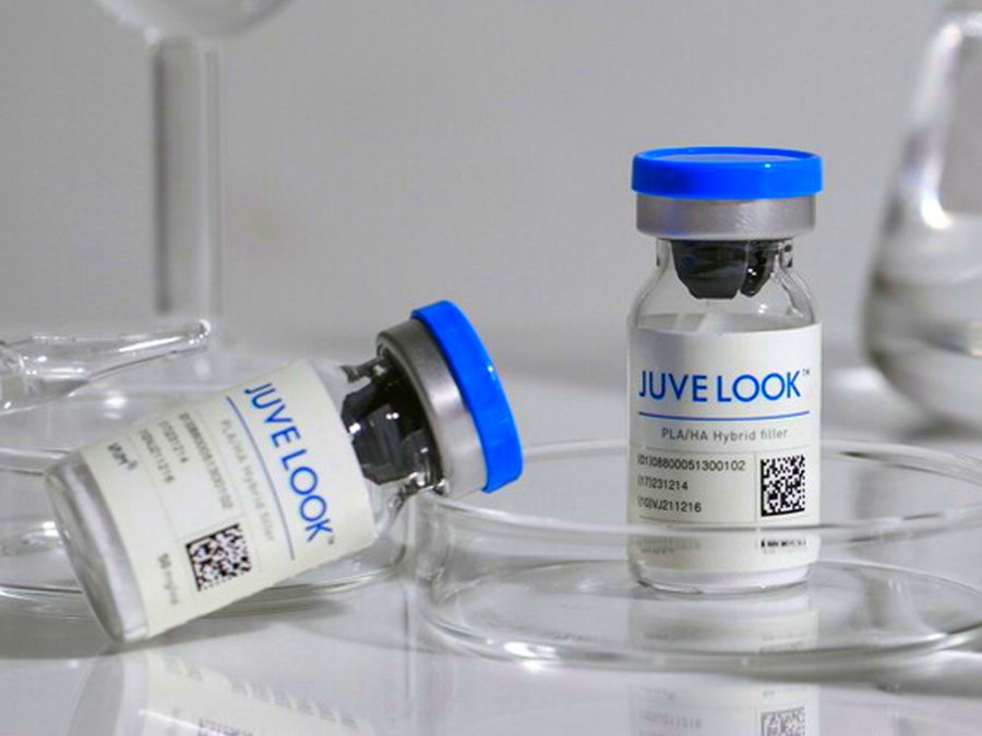قارورتان من Juvelook Booster موضوعتان على طبق زجاجي