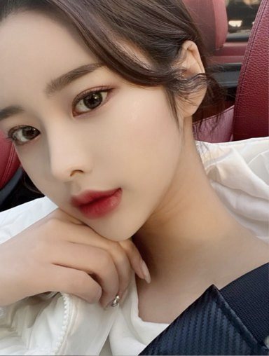 Selfie of a woman tilting her head inside a car