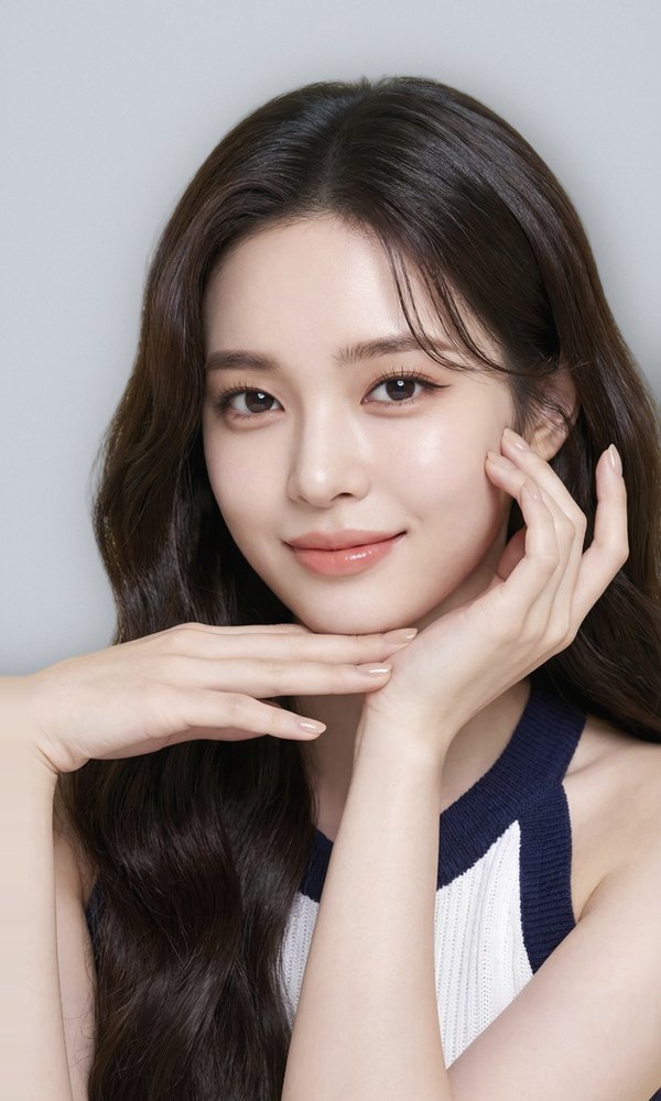 Ultherapy + Thermage Lifting signature shot — female model cupping her face with both hands